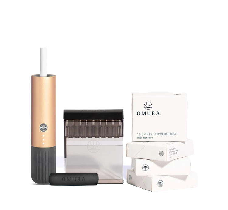 Omura S1 Starter Bundle in lustrous Gold, showcasing the vaporizer's luxurious design and compact form. The image displays the elegant gold finish, highlighting its eco-friendly Flowersticks and advanced technology for a superior vaping experience