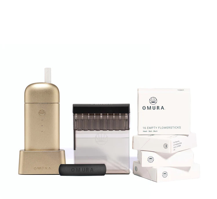 Showcasing the Omura X1 Starter Bundle in stunning Gold, including the cutting-edge Series X vaporizer, Home Fill System, and Flowerstick packs. The image highlights the vaporizer's luxurious gold finish and sleek design, along with its advanced Heat-not-Burn technology and commitment to environmental sustainability
