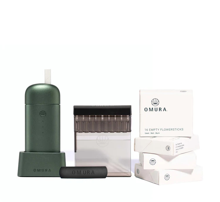 Omura X1 Starter Bundle Jade showing the Series X vaporizer, Home Fill System, and Flowerstick packs. The device's slim design and matching charging base are highlighted, emphasizing its advanced Heat-not-Burn technology and eco-friendly approach.